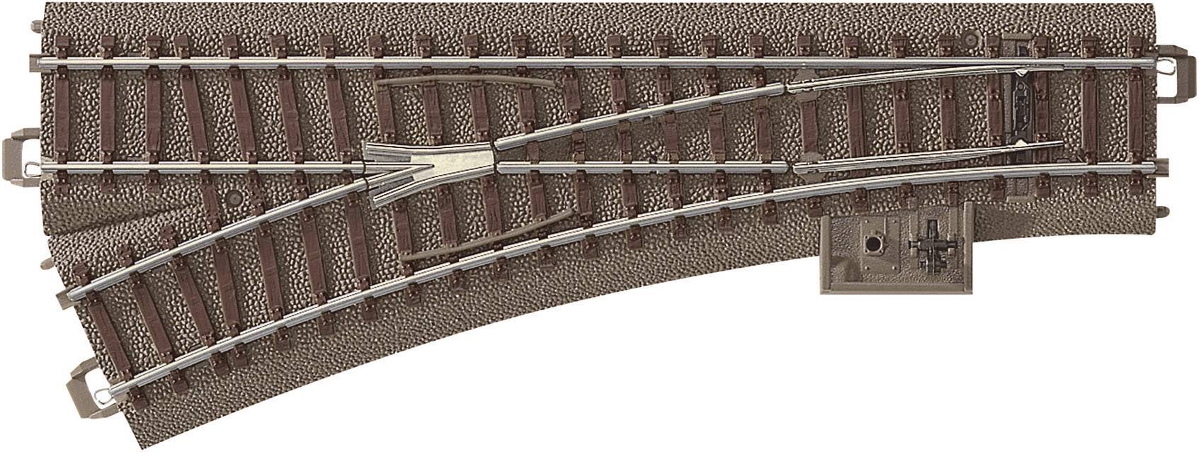 Soft iron railway tracks made of brown plastic with silver rail strands, showing a branch line to the right.