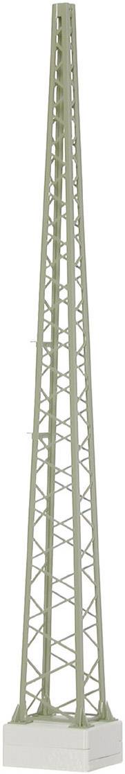 A tall, slender tower of metal struts, in the shape of a radio mast, mounted on a white base.
