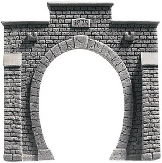 Stone arch with engraved year '1875'. Rustic architecture, symbolising historical building craftsmanship.