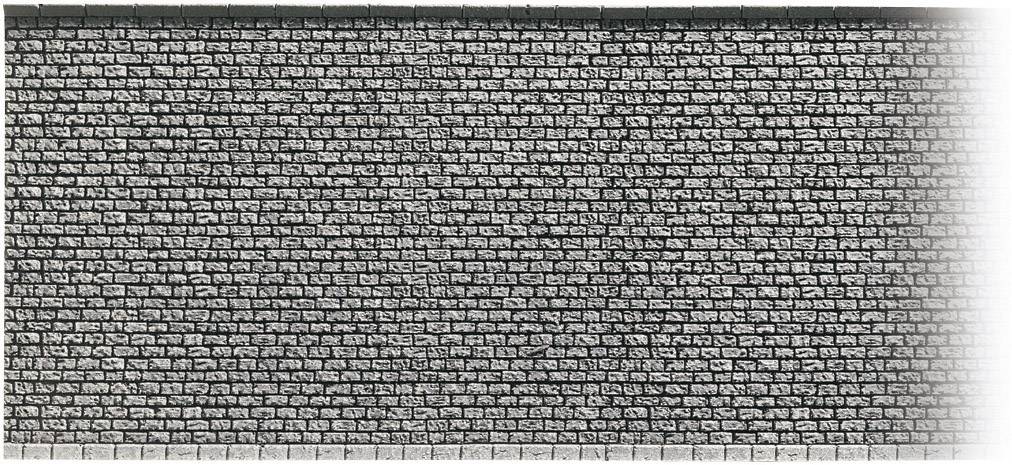 Grey brick wall with an even, structured pattern, conveying a robust and stable construction method.