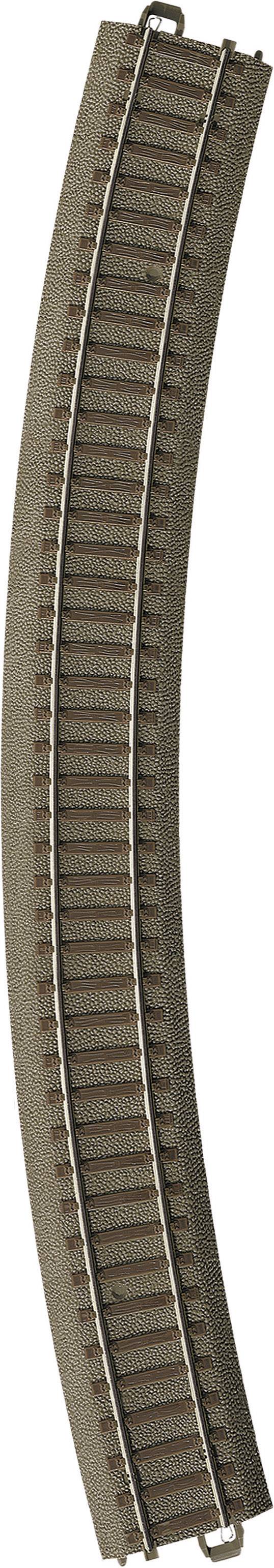 A curved model railway track made of plastic and metal, shown in a gentle curve from top left to bottom right.