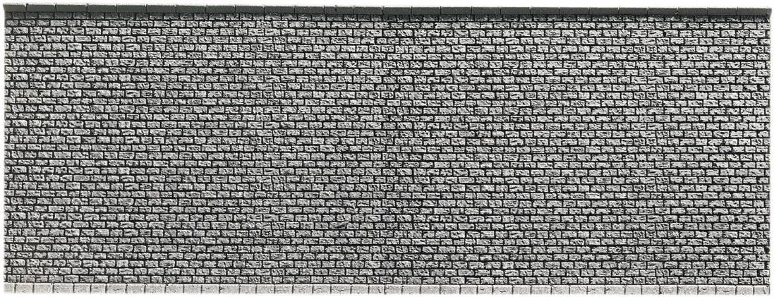A structured stone wall, whose uniform arrangement of grey stones conveys a sense of stability and pattern.