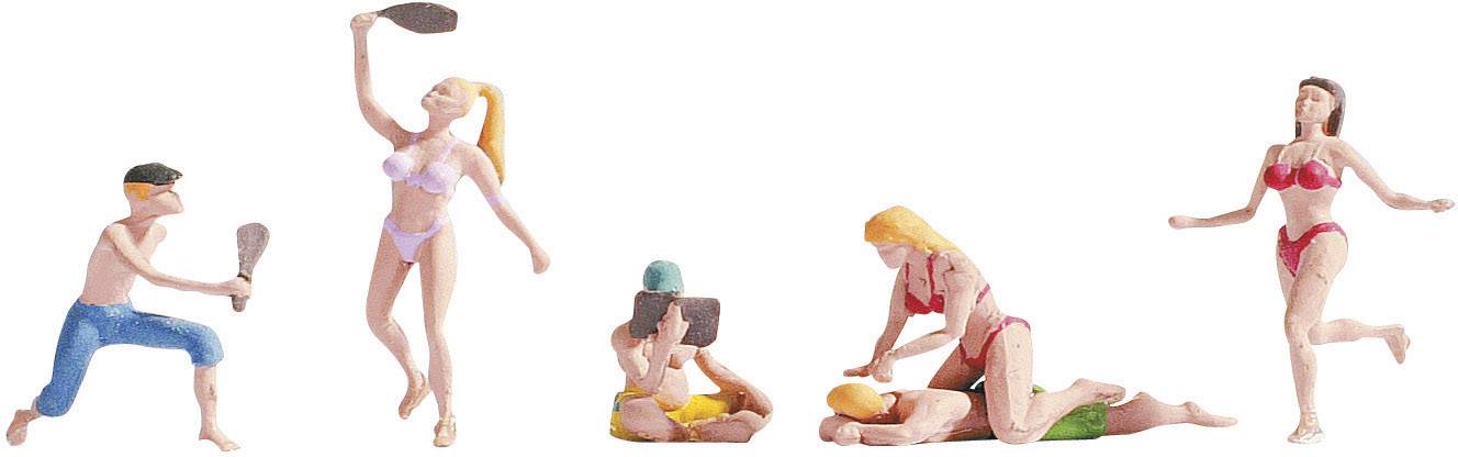 Miniature figures on the beach. A woman plays badminton with a man, two women are lying down and reading, one is running in a bikini.