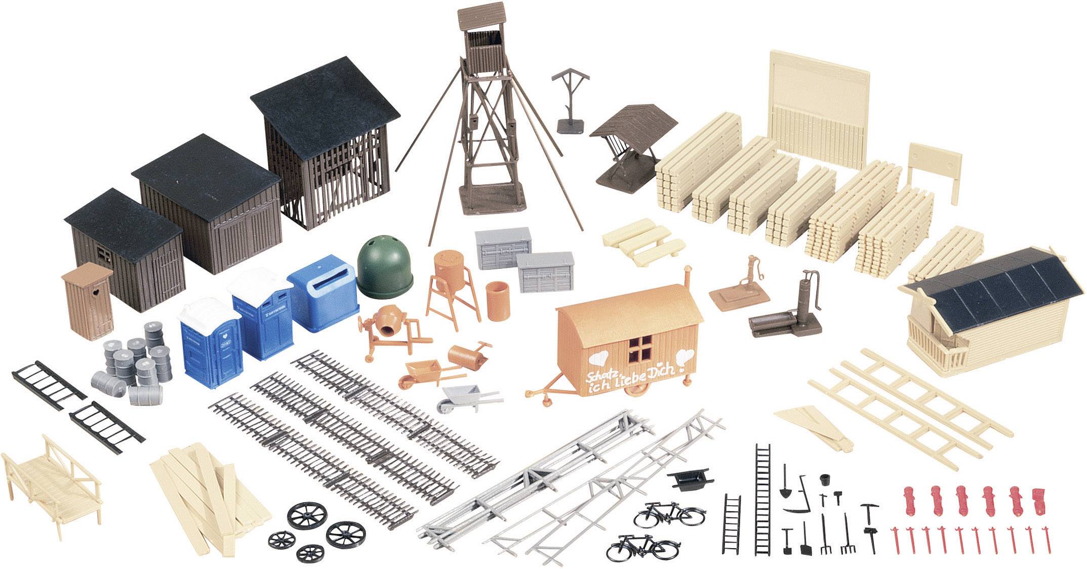 Set of model railway components, including buildings, tracks, bicycles and accessories, for realistic landscape design.