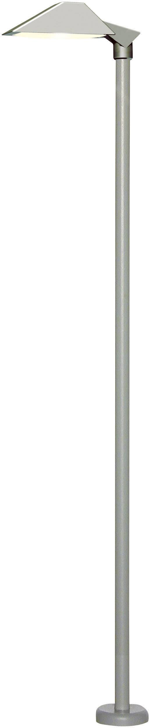 Floor lamp with a modern, sleek design and a rectangular shade. Silver-coloured metal rod and circular base.