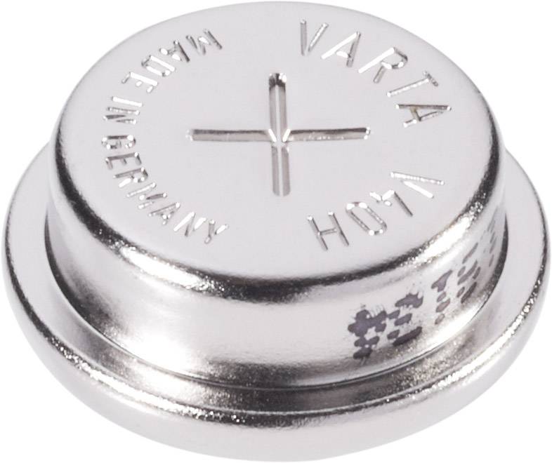 A silver button cell battery with the inscription 'Varta 1.4V Made in Germany'. It shows a plus sign marking the positive side.