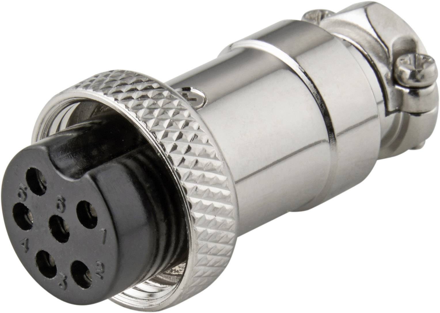 A silver multi-pin plug with seven contact holes and a ribbed casing, presumably for electrical connections.
