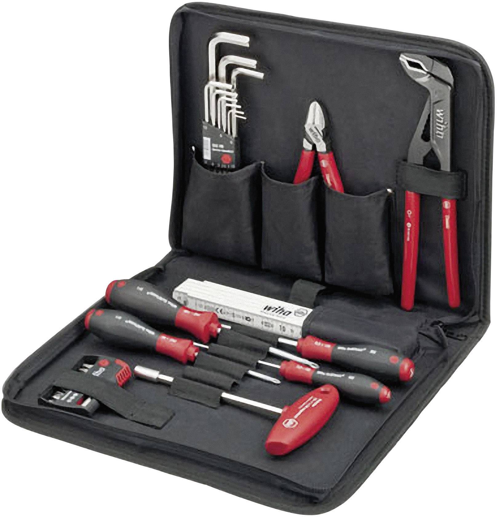 An open tool set with multiple screwdrivers, pliers and hex keys in a black case.
