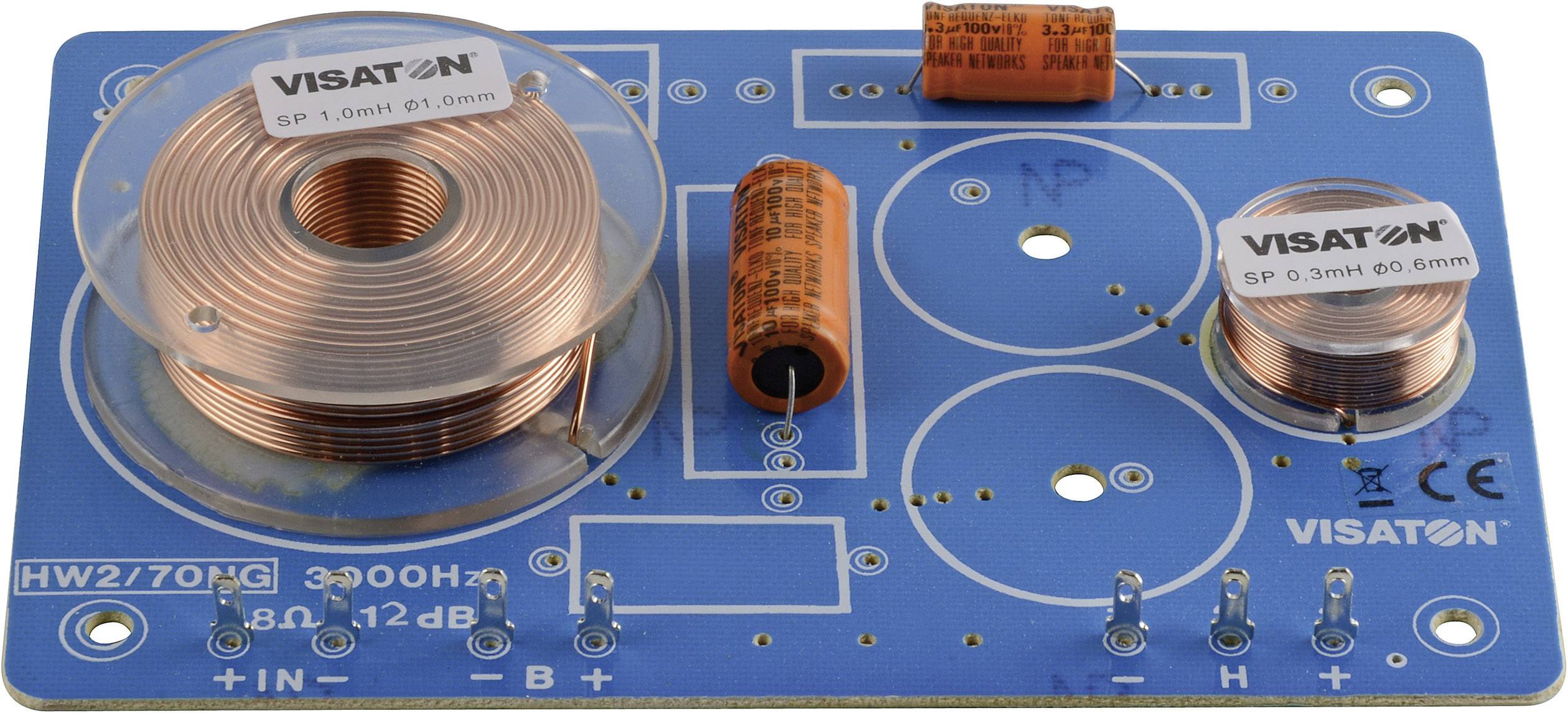 A blue crossover network with copper coils and capacitors by Visaton. Suitable for speakers with a 3000 Hz frequency and 8 ohms.