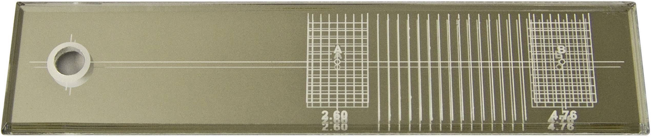 A rectangular glass with several printed measurement lines and numbers, which could be used to monitor ocular acoustics.