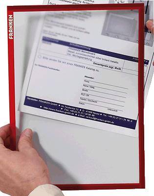 A person is holding a red-framed document with a technical drawing and product information from the company FRANKEN in their hands.