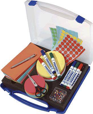 An open suitcase containing colourful markers, round sticky notes, adhesive dots, a ballpoint pen, scissors and drawing pins.