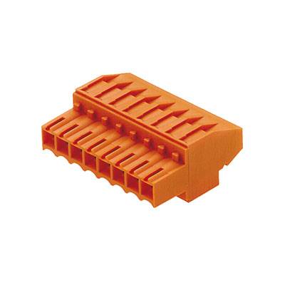 An orange electrical connector with multiple contact openings, used for wiring in electrical devices.