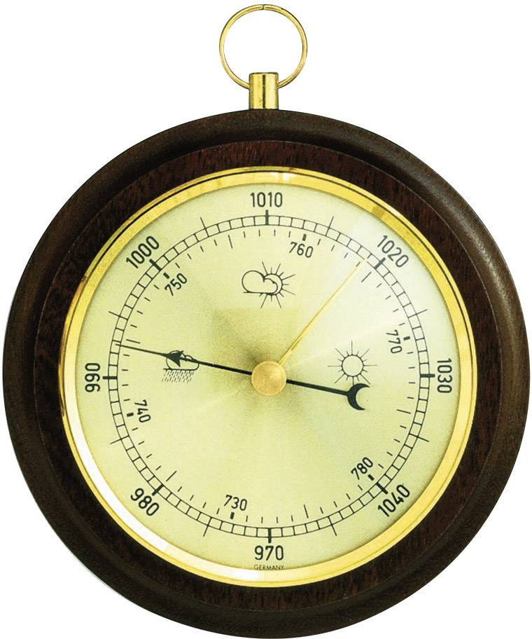 A round analogue barometer with a wooden frame displays air pressure values from 960 to 1060 hPa, illustrated with sun and cloud symbols.
