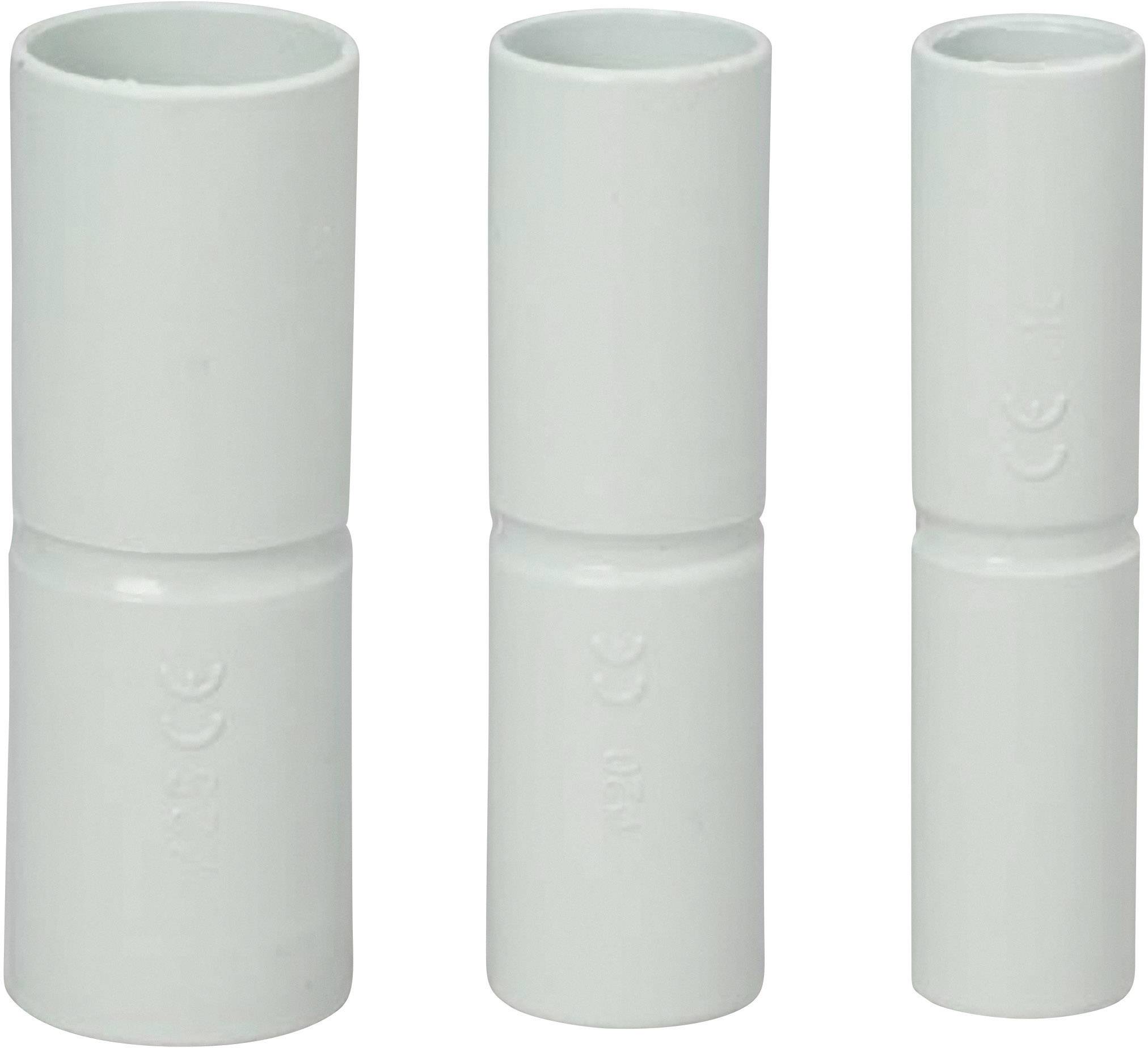 Three white plastic pipes of different lengths are positioned side by side. They are smooth and hollow, suitable for plumbing installations.