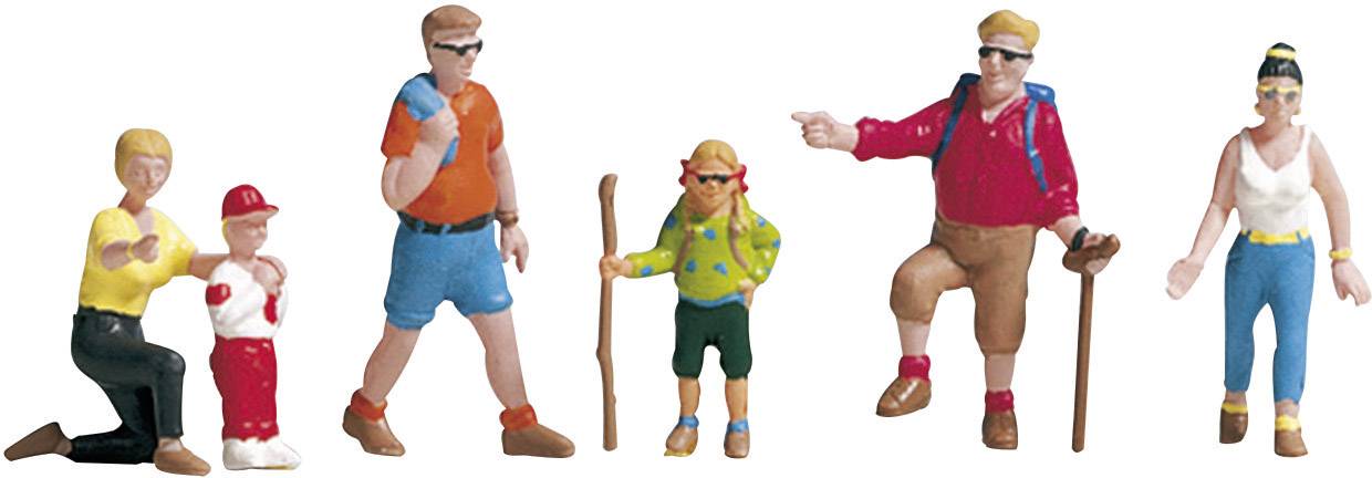 Six miniature figures: A kneeling couple with a child, two adults with walking sticks, a child, a teenager. They are wearing colourful casual clothing.