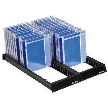 Hama CD stand with several blue CD cases arranged across two rows, positioned on a black, rectangular stand.
