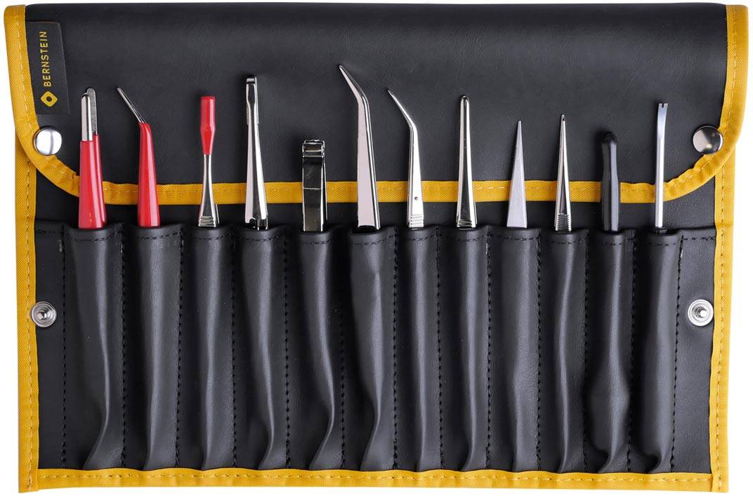 A set of ten precision tools in a rolled black case with yellow accents, suitable for delicate handcrafts.