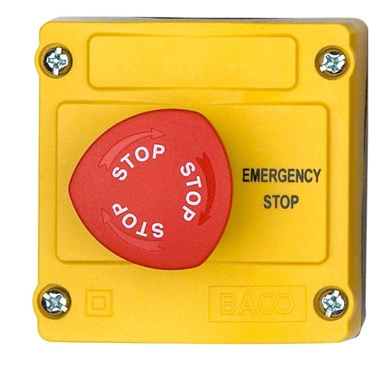 Yellow emergency stop switch with a red handle marked 'STOP'. Black-labelled with 'EMERGENCY STOP'.