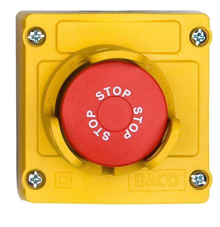 Yellow emergency stop switch with a red push button, with 'STOP' printed multiple times. Four screws secure the housing.