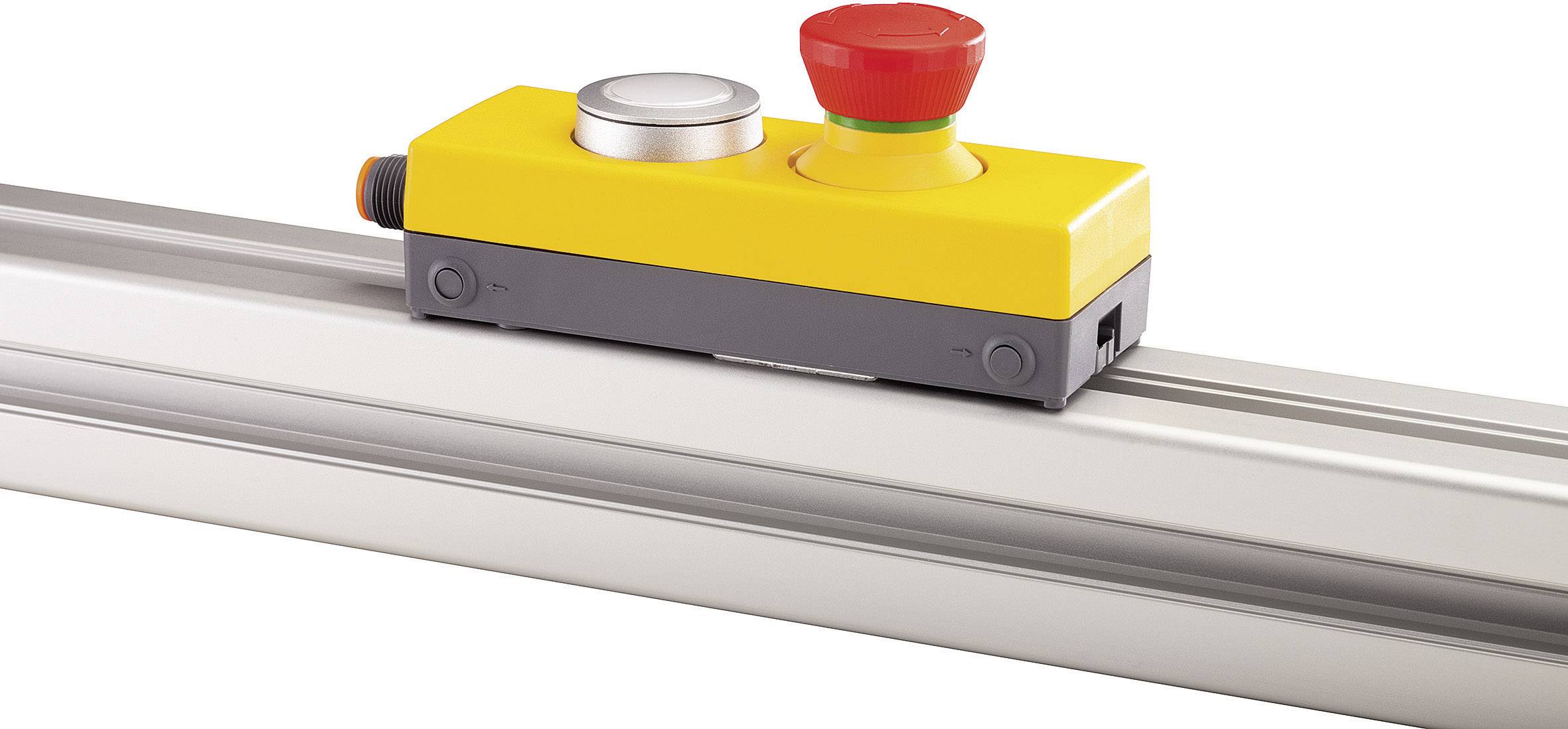 A yellow industrial emergency stop switch housing mounted on a metal rail, featuring a large red button and a smaller silver button.