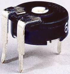 A black, round trimmer potentiometer with white markings and three metal pins, sits on a grey surface.