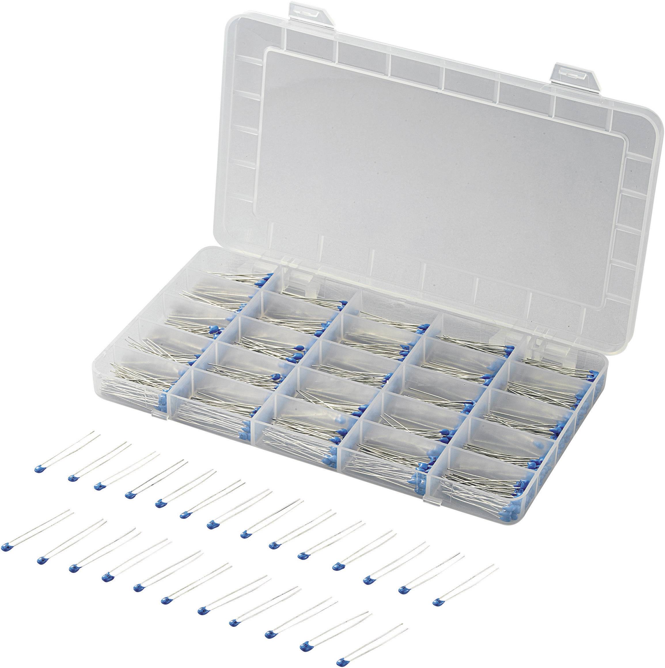 An open organiser box containing numerous small, white thermistor-like components with blue heads, arranged in individual compartments.