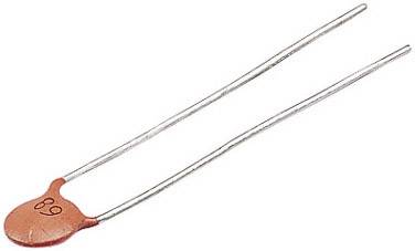 An orange ceramic capacitor with two long wire leads and the number '89' printed on it.