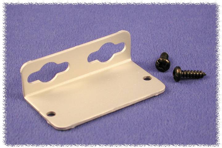 White metal angle bracket with two elongated holes, two black screws beside it, on a blue background. Suitable for wall mounting.