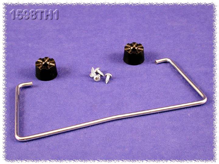 A metal bracket, two black plastic feet and five screws on a blue surface.