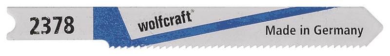 Saw blade with the inscription 'wolcraft 2378 Made in Germany', predominantly blue and silver, suitable for precise cutting.