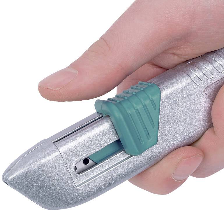 A hand is holding a silver pencil sharpener with a green, sliding cover.