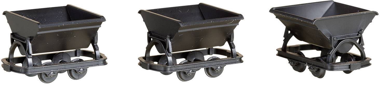 Three black trolleys on wheels, lined up side by side.