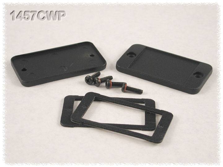 Two black plastic plates with screws and seals on a white background.