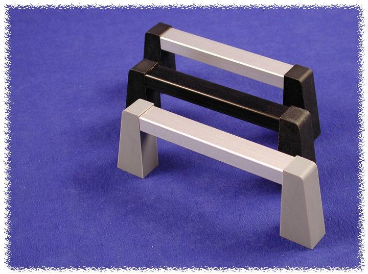 Three differently coloured handles on a blue background. The handles are stacked, one black and two in silver tones.