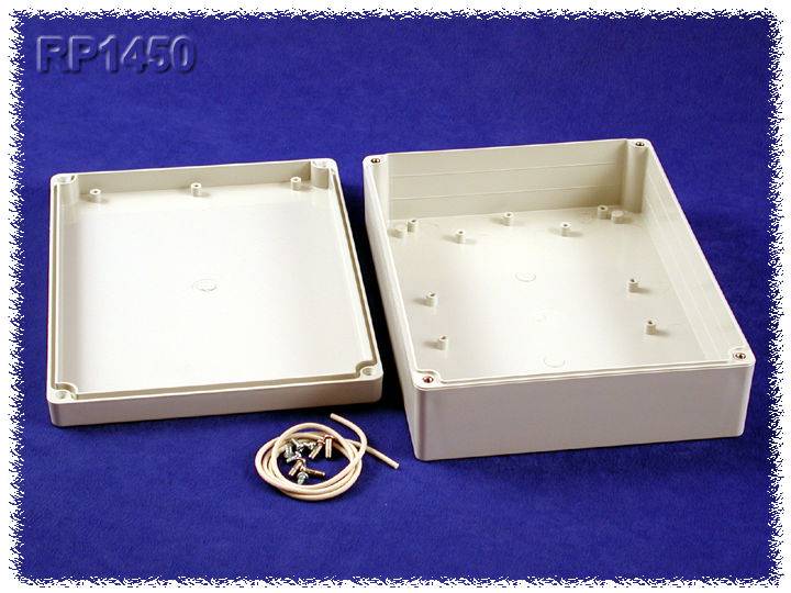 A grey plastic casing with a removable lid. Several screws and a cable are lying beside it. Background: blue fabric.