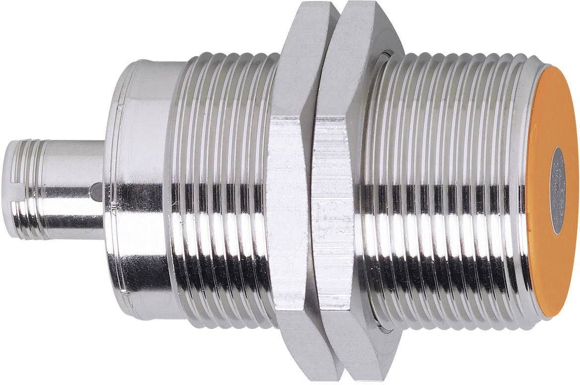 A cylindrical, metallic sensor with an orange head, installed in machines or devices for non-contact detection.