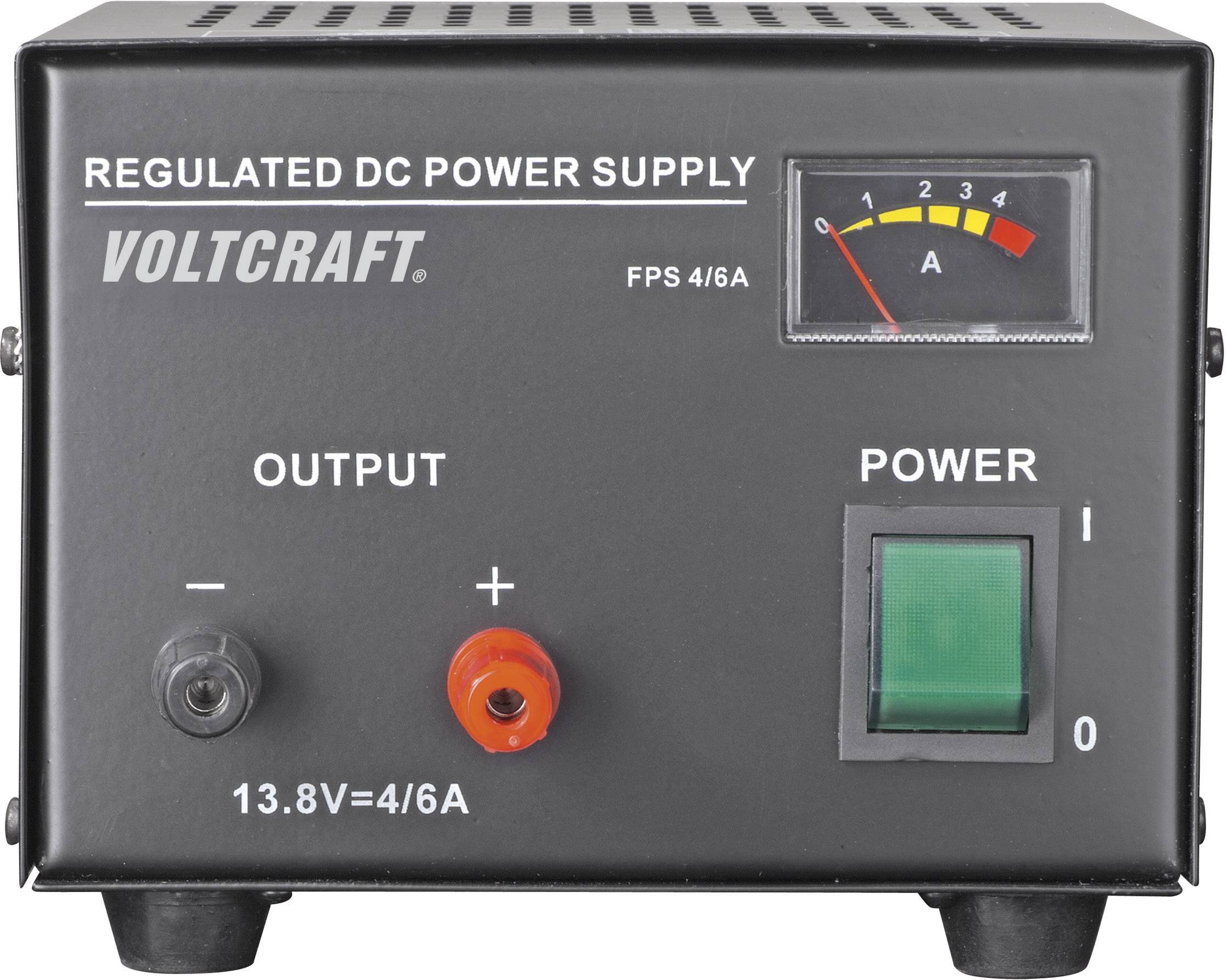 A regulated direct current power supply by Voltcraft with an ammeter in the top right and a green mains switch in the bottom right.
