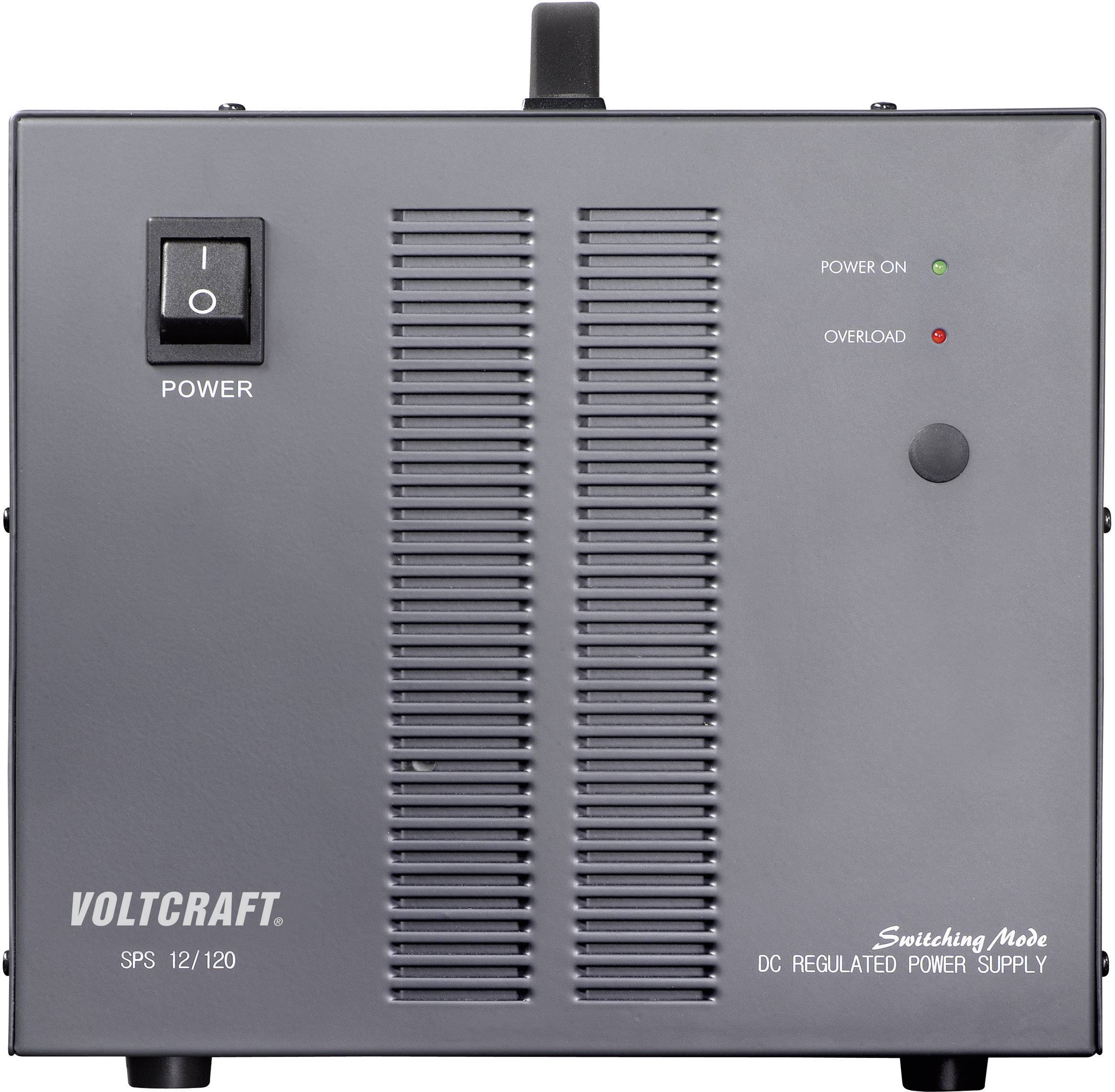 'Voltcraft SPS 12/120' power supply unit with switch, two LED indicators for operation and overload. Rectangular, grey design.
