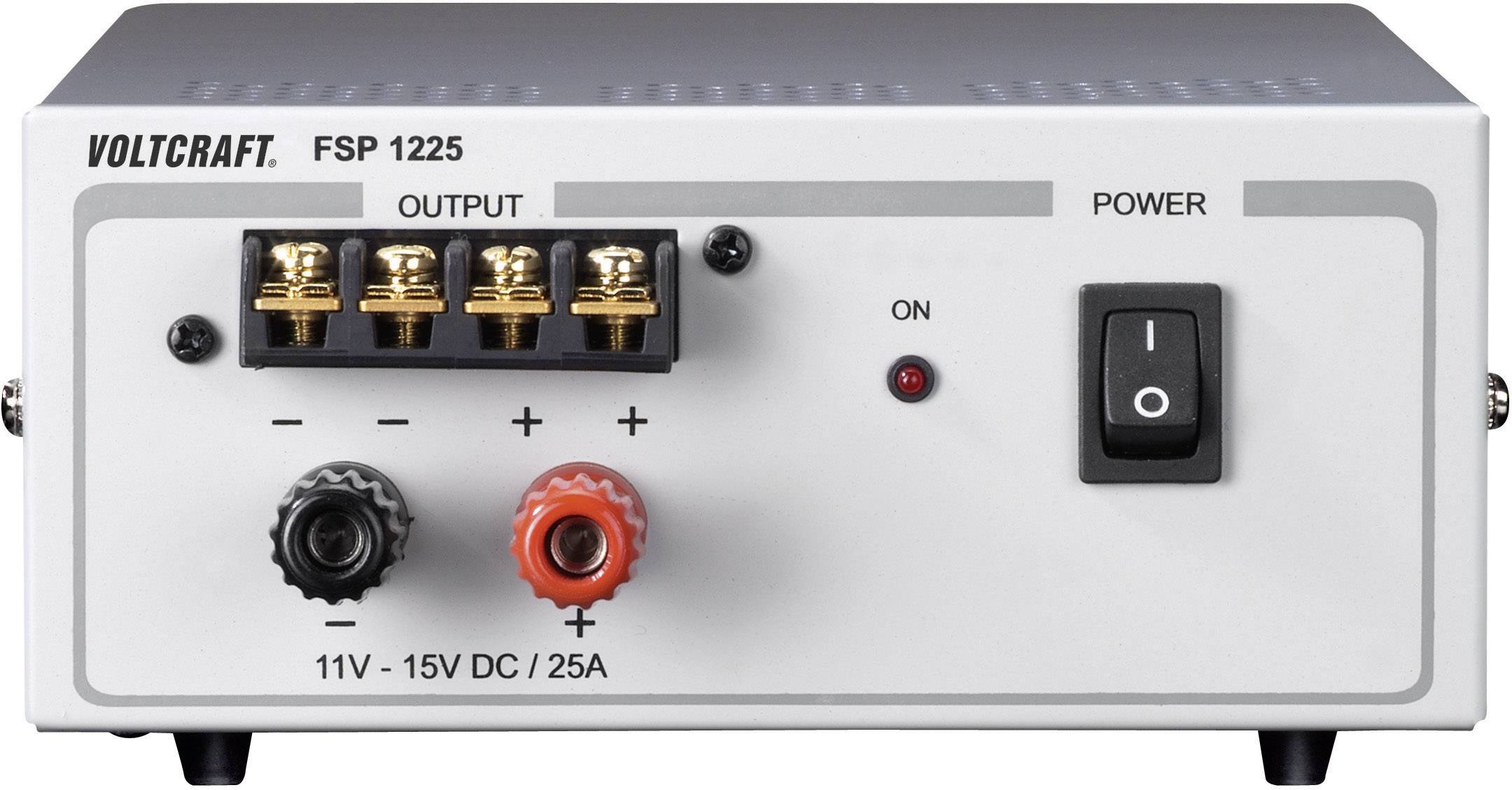 A power supply unit labelled 'VOLTCRAFT FSP 1225'. It has connectors for 'OUTPUT' and a switch for 'POWER'.