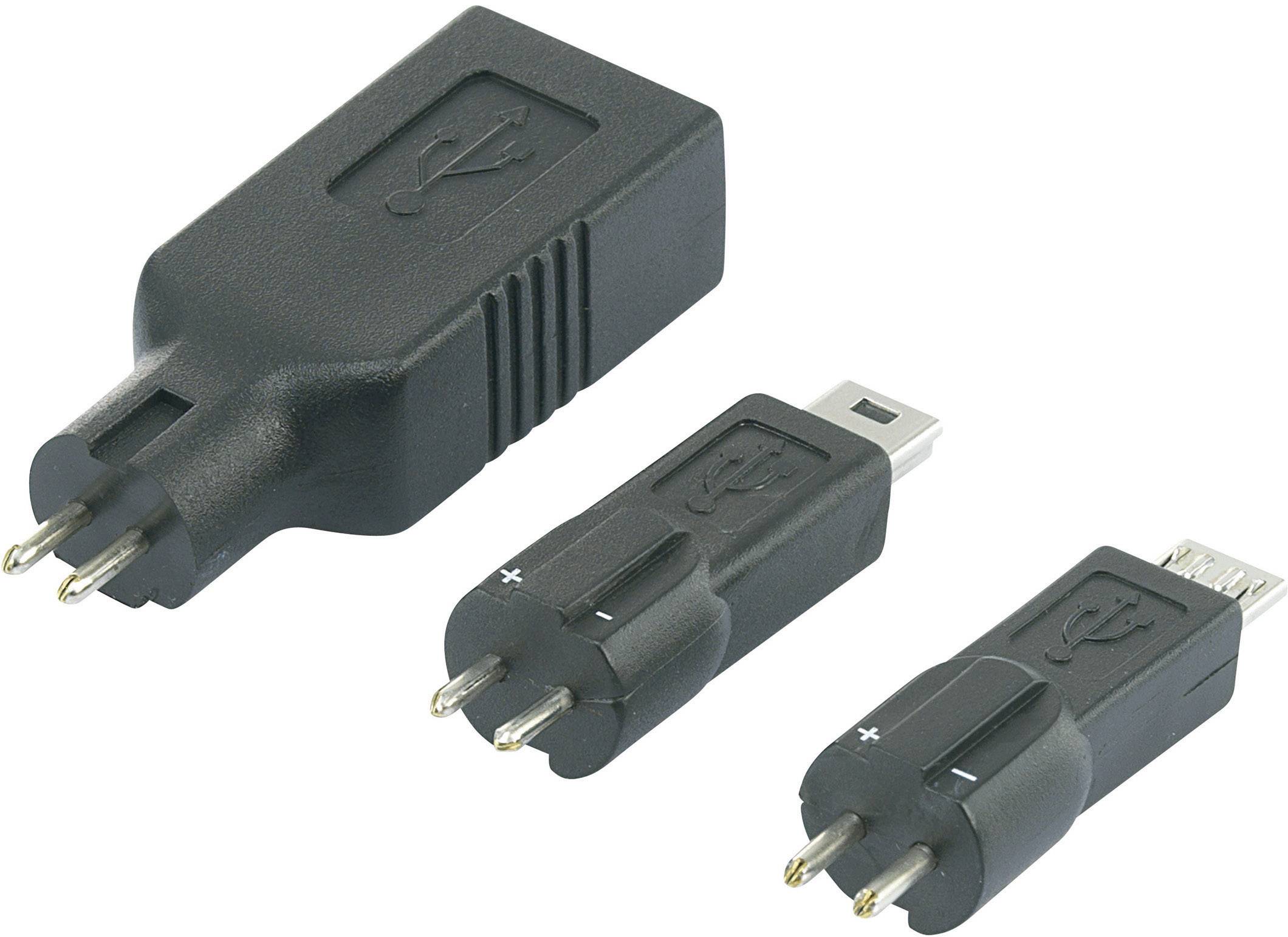 Three black USB connector adapters with different connection types, lying side by side, shown against a white background.
