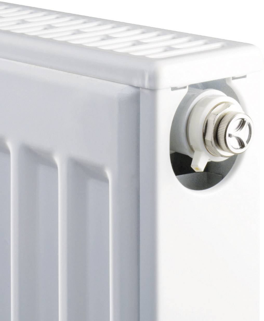 White radiator with side air vent, part of a heating system for room heating.