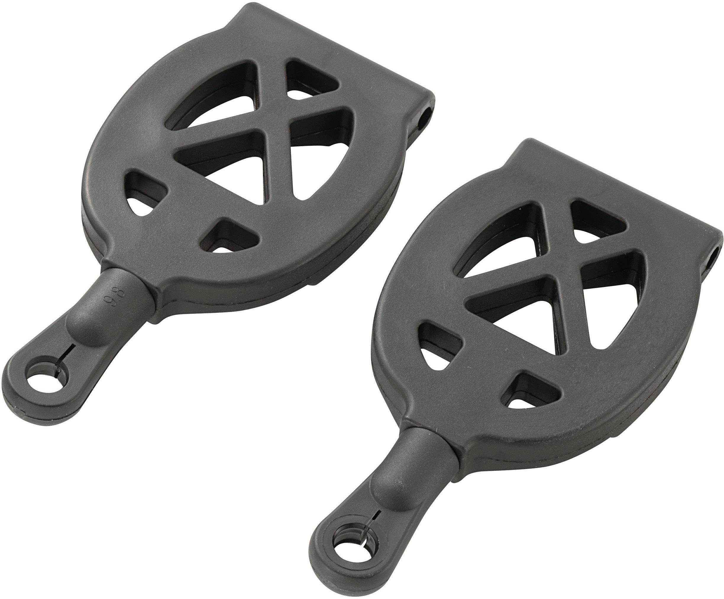 Two black plastic parts with round openings and eyelets at one end. They have a lattice structure and are identically shaped.