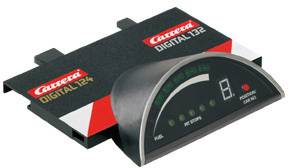 Digital slot car timer by Carrera with LED display and label 'DIGITAL 132'. Display shows current lap and fuel status.