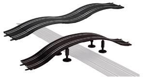 Two slot car racing track modules overlap, one with elevated sections on supports and a flat track underneath.