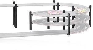 Toy racing track with two small racing cars on a spiral circuit. The track is made of grey plastic with black supports.