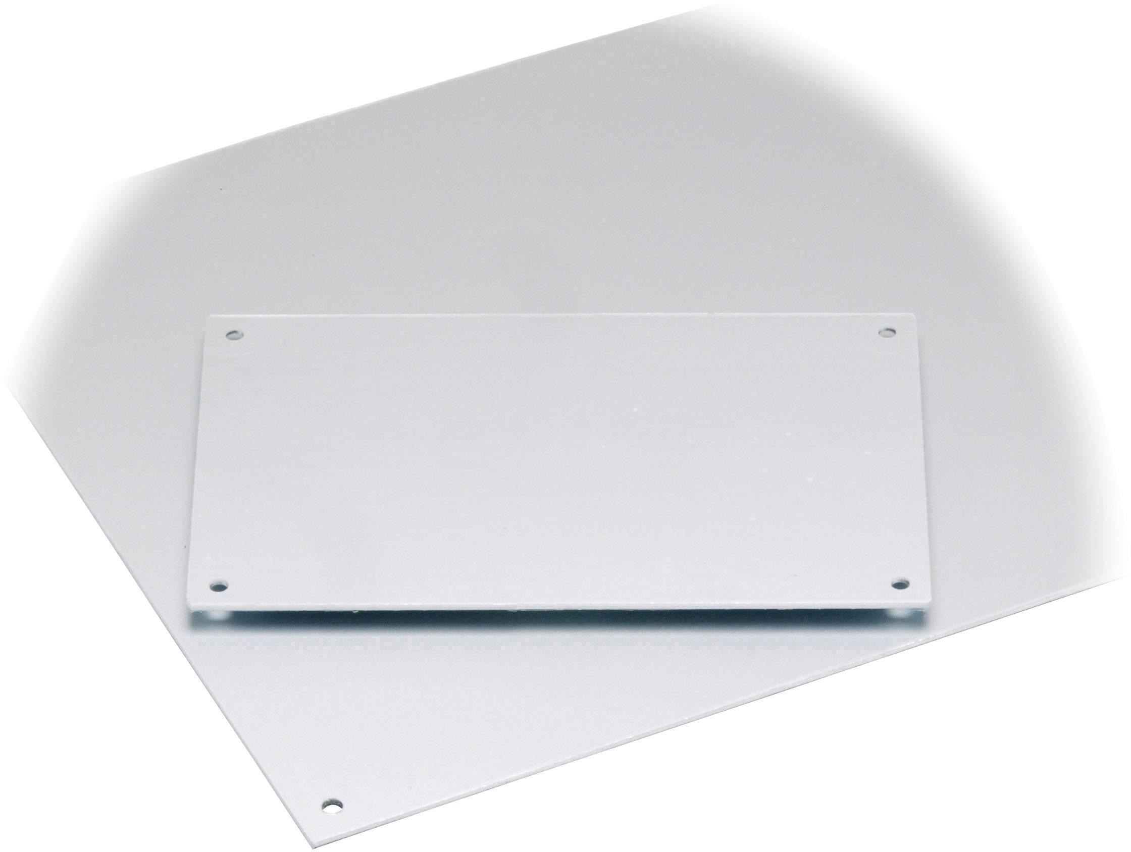 A rectangular, silver metal sheet is lying on a flat surface.