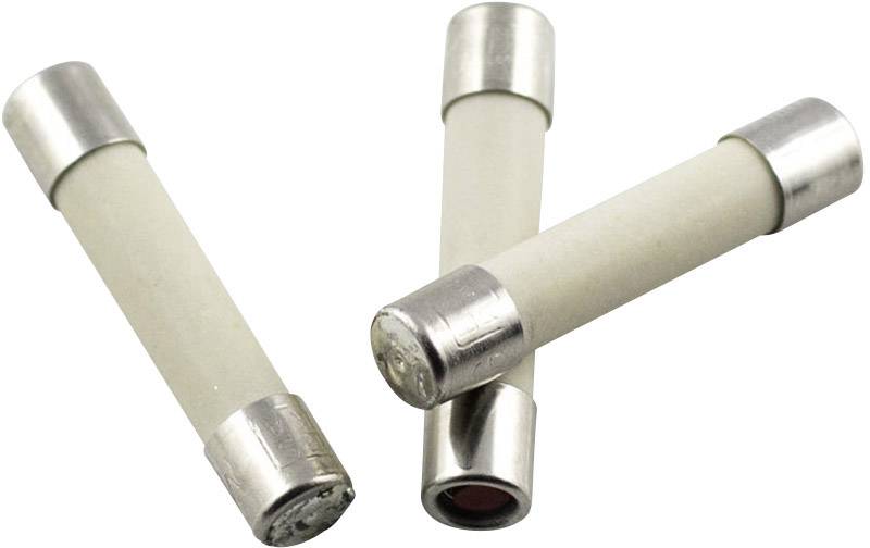 Three fine fuses with a cylindrical ceramic body and metallic end caps. They are used to protect electrical devices from overloading.