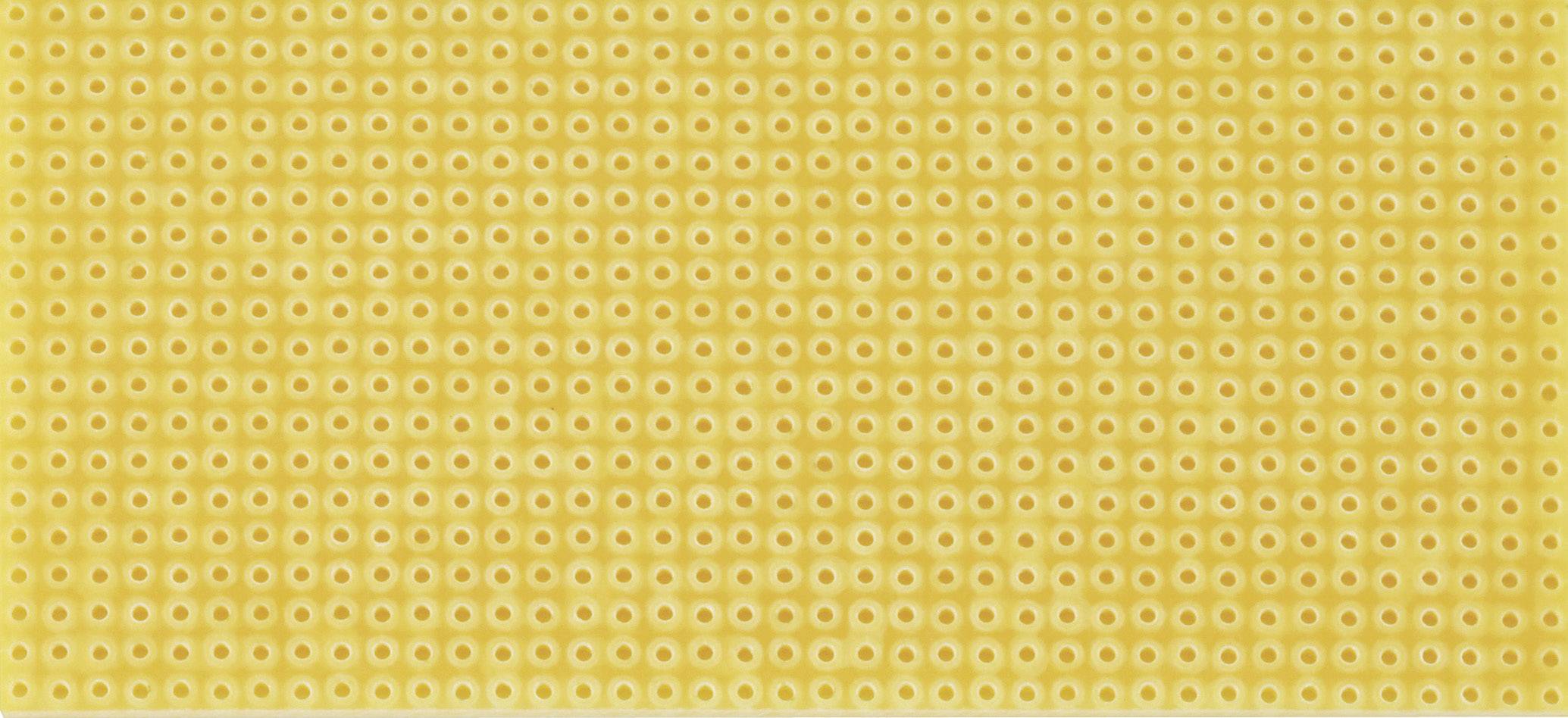 Yellow perforated circuit board with regular rows of small holes, for mounting electronic components.