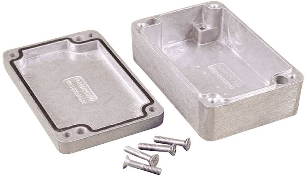 Rectangular metal enclosure with its cover removed, with four screws beside it. Suitable for electrical component assembly.